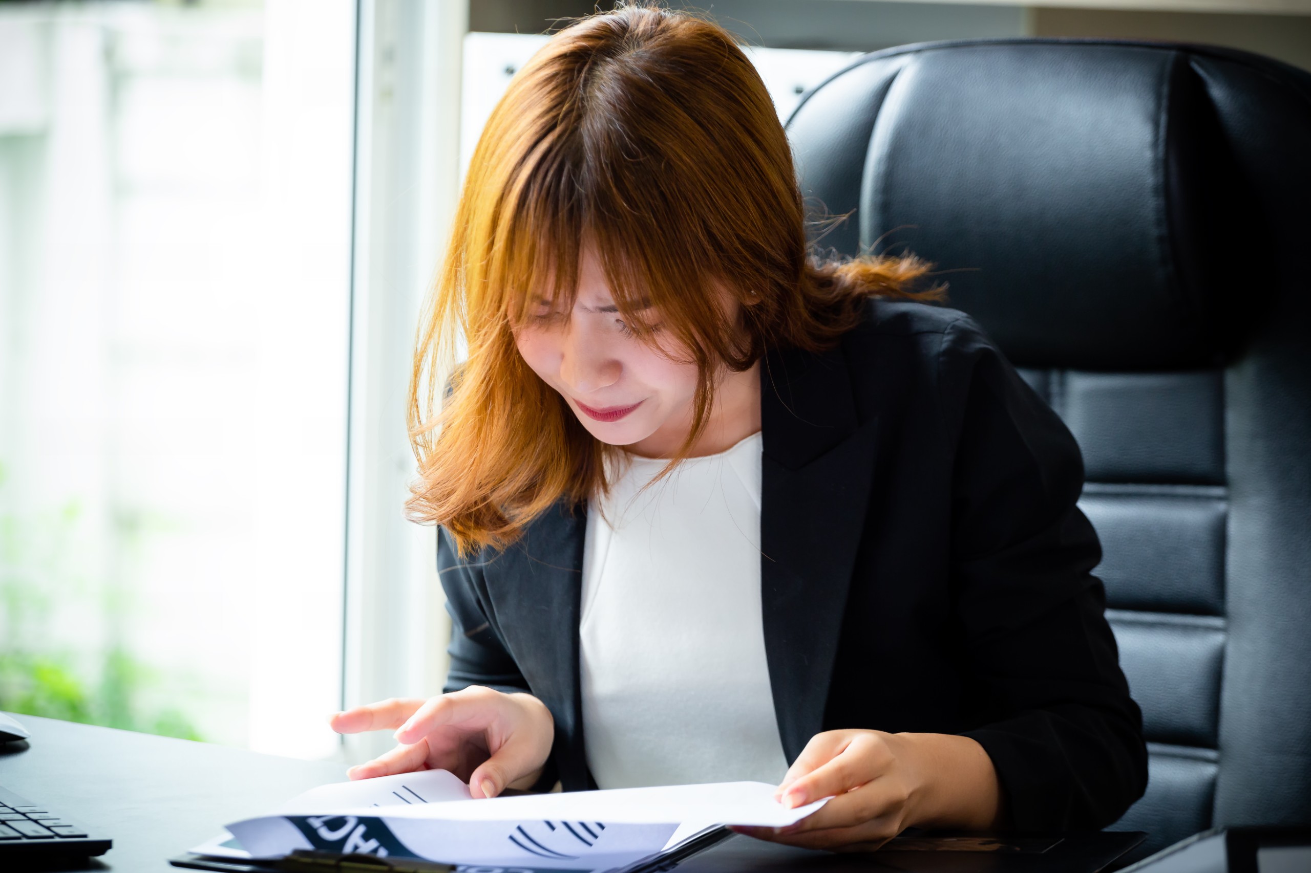 nomination and remuneration - young-boss-serious-while-checking-paperwork